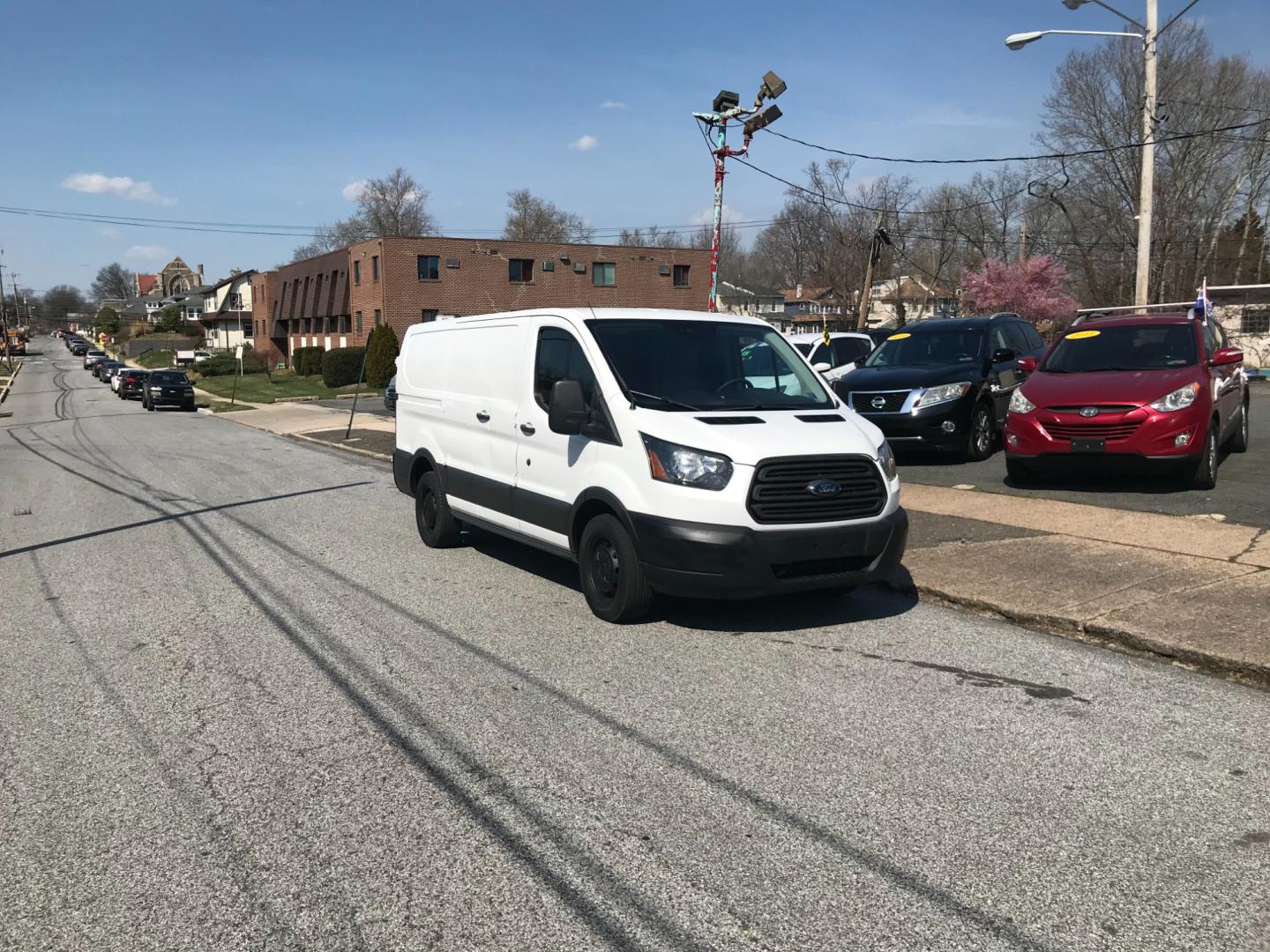 2016 White /Gray Ford Transit 150 Low Roof (1FTYE1ZM0GK) with an 3.7 V6 engine, Automatic transmission, located at 577 Chester Pike, Prospect Park, PA, 19076, (610) 237-1015, 39.886154, -75.302338 - Photo#1